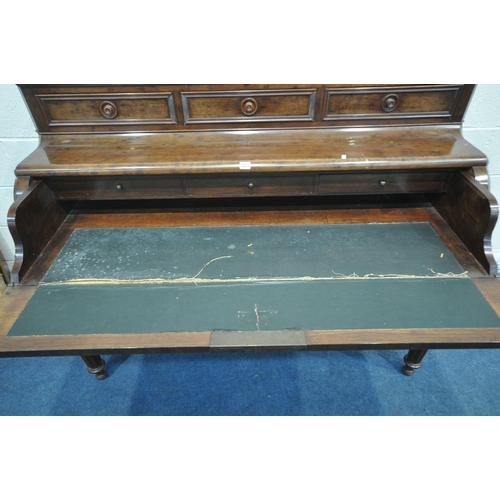 1223 - A VICTORIAN MAHOGANY DESK, the removable top section with three fall front drawers, above a sliding ... 