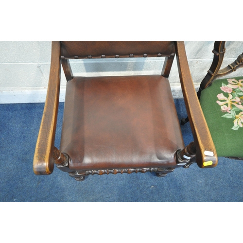 1235 - A 20TH CENTURY OAK ARMCHAIR, with leather backrest and seat, on block and turned legs, united by a f... 