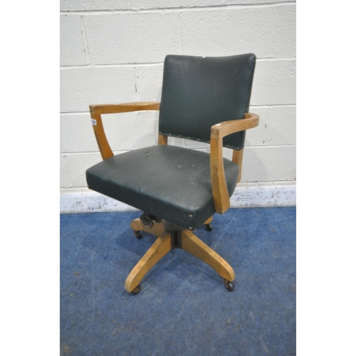 1329 - AN EARLY 20TH CENTURY SWIVEL OFFICE CHAIR, with green leatherette upholstery label to underside read... 