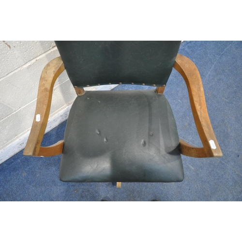 1329 - AN EARLY 20TH CENTURY SWIVEL OFFICE CHAIR, with green leatherette upholstery label to underside read... 