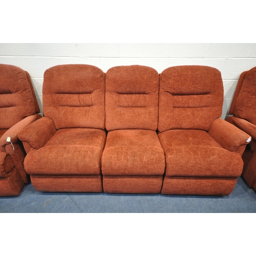 1333 - A RED UPHOLSTERED THREE PIECE LOUNGE SUITE, comprising a three seater sofa, length 196cm x depth 96c... 