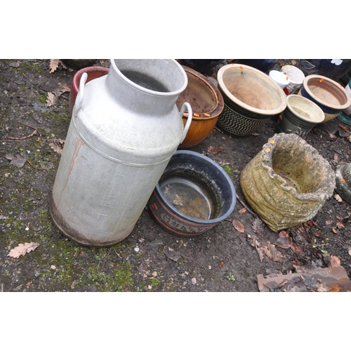 1011 - A MODERN COMPOSITE BIRD BATH 75cm high, a Milk Marketing Board aluminium milk churn, a Guinness ice ... 