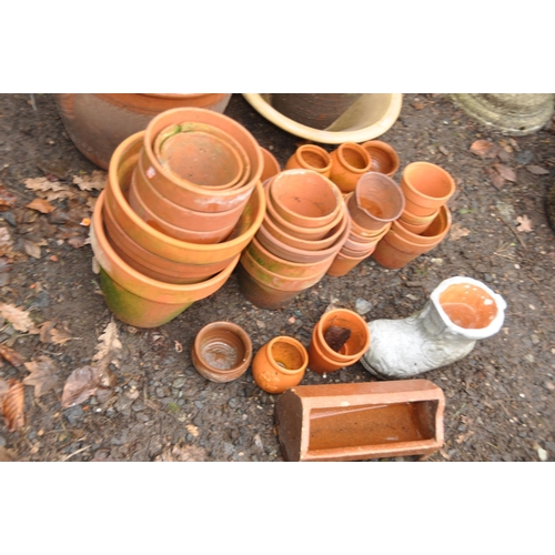 1021 - A COLLECTION OF TWO GLAZED PLANTERS AND A QUANTITY OF TERRACOTTA POTS of various sizes including a t... 