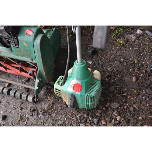 1028 - A VINTAGE SUFFOLK PUNCH 43s PETROL LAWN MOWER with grass box and a Florabest FBS43A1 petrol strimmer... 