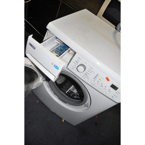 1068 - A ZANUSSI LINDO 100 WASHING MACHINE width 60cm depth 56cm height 85cm (spin cycle run but not tested... 