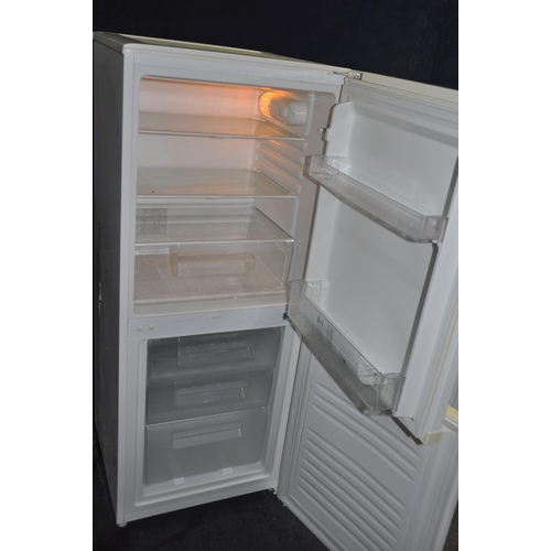 1077 - A CURRY'S ESSENTIAL CE55CW13 FRIDGE FREEZER width 55cm depth 56cm height 136cm (PAT pass and working... 