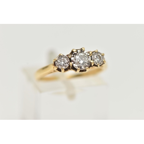 1 - A THREE STONE DIAMOND RING, three round brilliant cut diamonds, in a white metal illusion setting wi... 