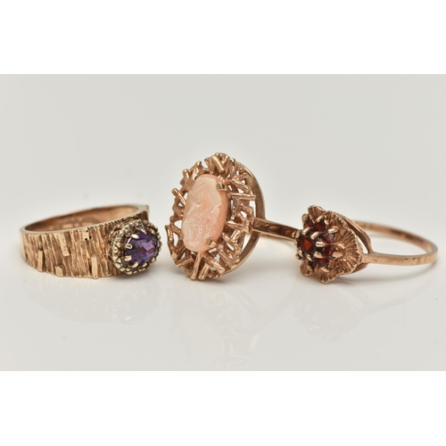 14 - THREE 9CT YELLOW GOLD GEM SET DRESS RINGS, to include a garnet cluster ring, an amethyst single ston... 