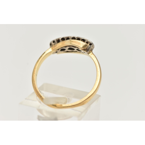 16 - A YELLOW METAL DIAMOND FIVE STONE RING, set with graduating single cut diamonds, to the plain polish... 