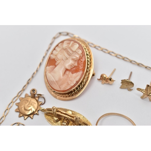 18 - A SELECTION OF YELLOW METAL JEWELLERY, to include a shell cameo brooch, stamped 9ct, a 9ct gold char... 