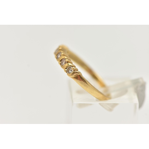 20 - AN 18CT GOLD DIAMOND BAND RING, six round brilliant cut diamonds, prong set in yellow gold, hallmark... 