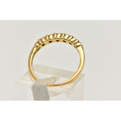 20 - AN 18CT GOLD DIAMOND BAND RING, six round brilliant cut diamonds, prong set in yellow gold, hallmark... 