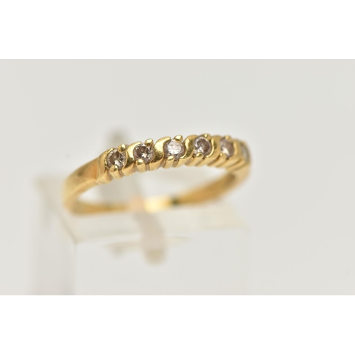 20 - AN 18CT GOLD DIAMOND BAND RING, six round brilliant cut diamonds, prong set in yellow gold, hallmark... 