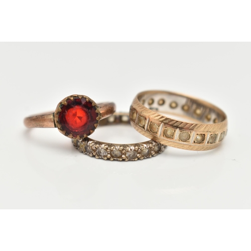 24 - THREE ASSORTED RINGS, to include a 9ct gold and spinel full set eternity band ring, approximate widt... 