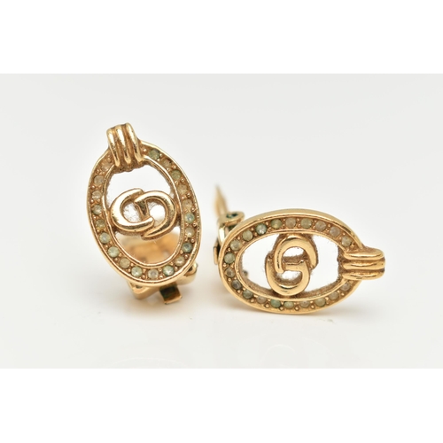 27 - A PAIR OF 'CHRISTIAN DIOR' COSTUME CLIP ON EARRINGS, each of an oval form with CD lettering, in a su... 