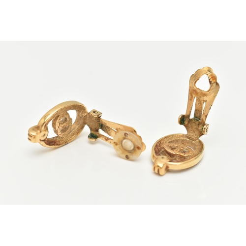 27 - A PAIR OF 'CHRISTIAN DIOR' COSTUME CLIP ON EARRINGS, each of an oval form with CD lettering, in a su... 