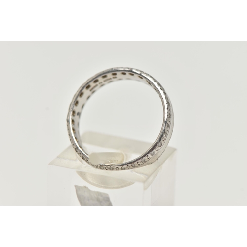 3 - A PLATINUM AND DIAMOND BAND RING, a central polished band with diamond set edges, approximately 58 r... 