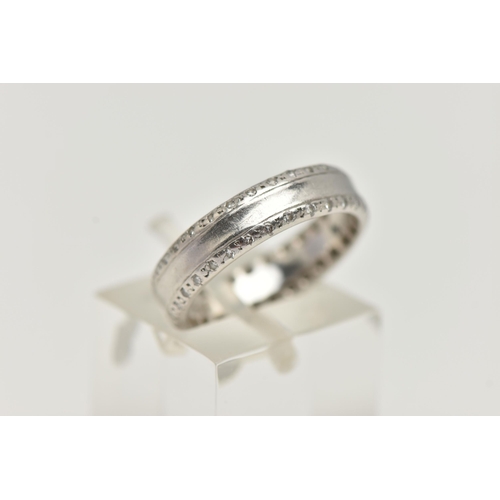 3 - A PLATINUM AND DIAMOND BAND RING, a central polished band with diamond set edges, approximately 58 r... 