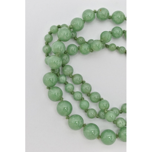 34 - A JADE BEAD NECKLACE, designed as a graduated row of spherical beads measuring approximately 5mm to ... 