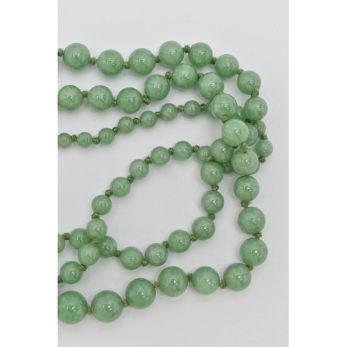 34 - A JADE BEAD NECKLACE, designed as a graduated row of spherical beads measuring approximately 5mm to ... 