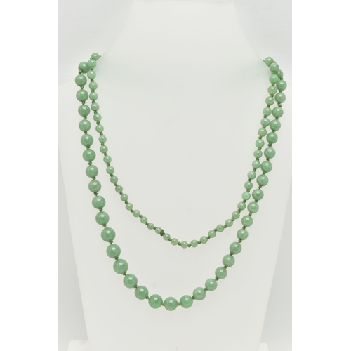 34 - A JADE BEAD NECKLACE, designed as a graduated row of spherical beads measuring approximately 5mm to ... 