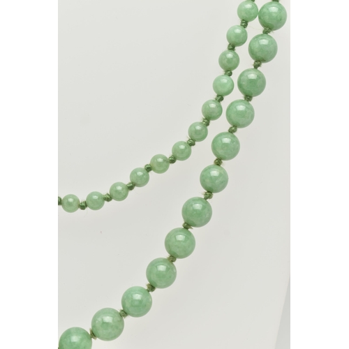 34 - A JADE BEAD NECKLACE, designed as a graduated row of spherical beads measuring approximately 5mm to ... 