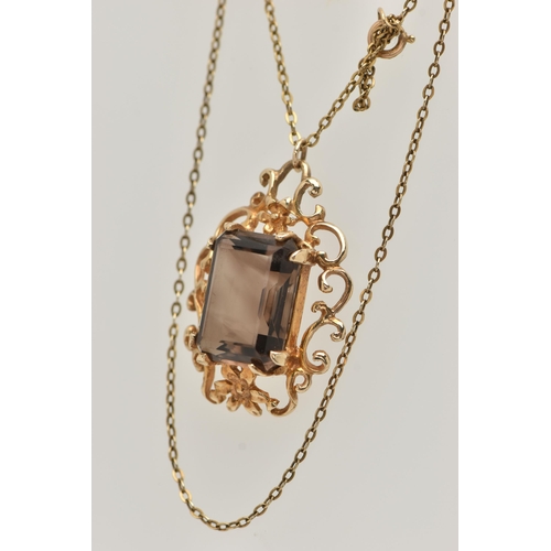 36 - A 9CT SMOKY QUARTZ PENDANT NECKLACE, the rectangular smoky quartz in a claw setting to the scrolling... 