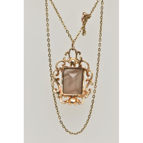 36 - A 9CT SMOKY QUARTZ PENDANT NECKLACE, the rectangular smoky quartz in a claw setting to the scrolling... 