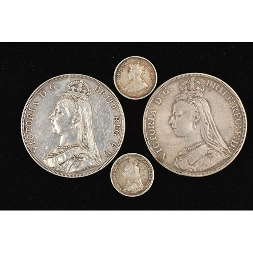 39 - FOUR COINS, to include two Victoria crowns dated 1887 and 1890, together with a Victoria three pence... 