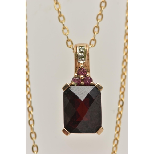 40 - A 9CT GOLD GARNET PENDANT, the rectangular faceted garnet in a four claw setting with further circul... 