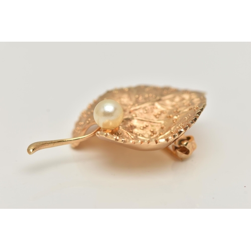 46 - A 'CHRISTIAN DIOR' LEAF BROOCH, set with an imitation pearl, fitted with a brooch pin and saftey cla... 