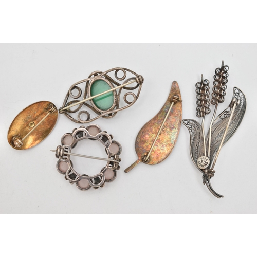 49 - FIVE BROOCHES, to include a white guilloche enamel leaf brooch, fitted with a brooch pin and safety ... 