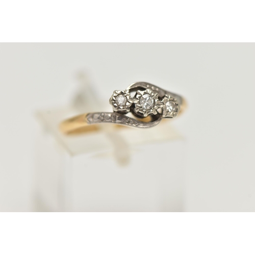 5 - A THREE STONE DIAMOND RING, three single cut diamonds, illusion set in white metal, leading onto whi... 