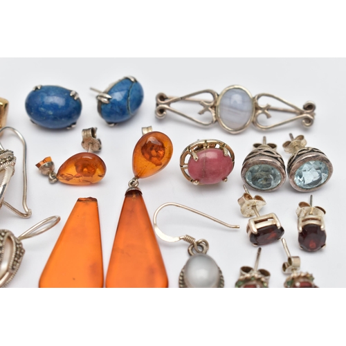 53 - A SMALL BAG OF EARRINGS, eight pairs of white metal earrings, such as two pairs of garnet studs, sod... 