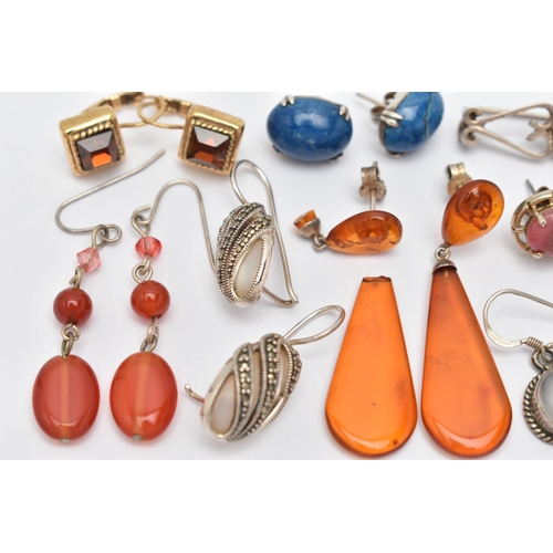 53 - A SMALL BAG OF EARRINGS, eight pairs of white metal earrings, such as two pairs of garnet studs, sod... 