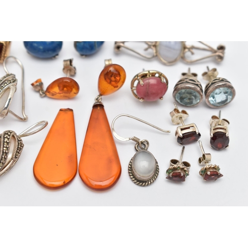 53 - A SMALL BAG OF EARRINGS, eight pairs of white metal earrings, such as two pairs of garnet studs, sod... 