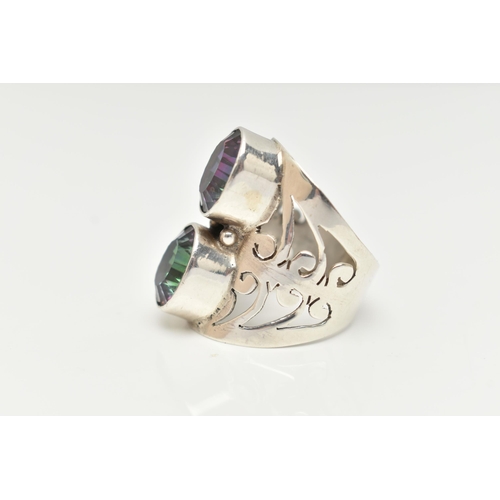 60 - A LARGE WHITE METAL MYSTIC QUARTZ DRESS RING, collet set with two oval cut mystic coated quartz, to ... 