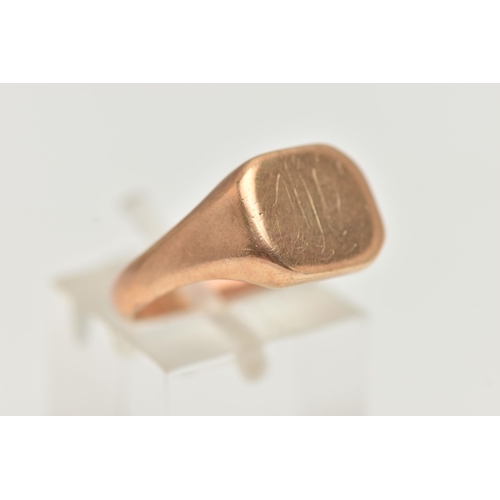 9 - A GENTS SIGNET RING, rose metal square signet, rubbed monogram engraving, stamped 9ct, ring size P 1... 