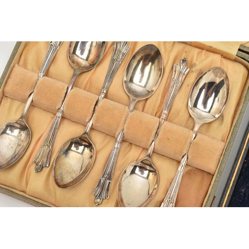 117 - TWO CASED SETS OF SILVER TEASPOONS, the first including six spoons, decorated with floral terminals,... 