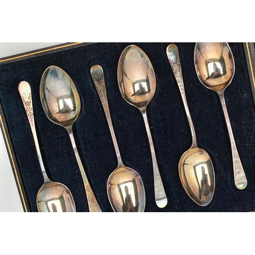 117 - TWO CASED SETS OF SILVER TEASPOONS, the first including six spoons, decorated with floral terminals,... 