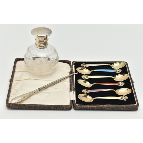 123 - A CASED SET OF TEASPOONS AND A SCENT BOTTLE, a set of six gilt metal and colourful enamel teaspoons,... 