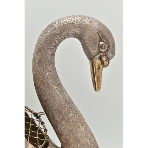 127 - AN ELIZABETH II SILVER FLORAL CENTREPIECE, realistically textured swan with a gold plated beak, open... 