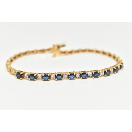 64 - A SAPPHIRE AND DIAMOND BRACELET, designed as a central section of ten oval cut sapphires interspaced... 