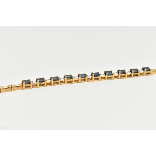 64 - A SAPPHIRE AND DIAMOND BRACELET, designed as a central section of ten oval cut sapphires interspaced... 