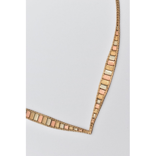 65 - A 9CT GOLD TRI-COLOUR NECKLACE, the tapered V-shape necklace with flattened herringbone chain, to th... 