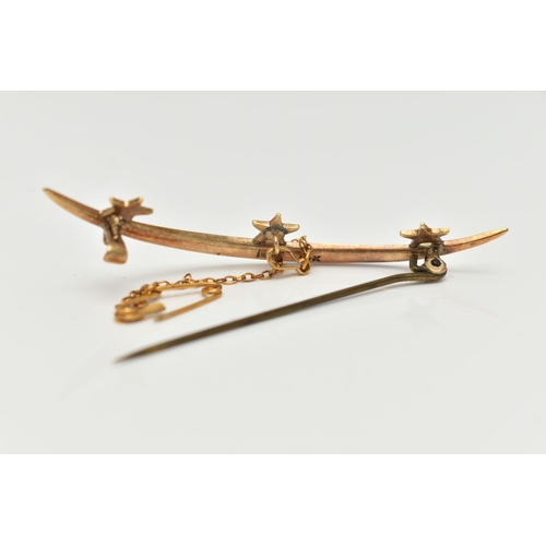 66 - A SEED PEARL BROOCH, designed as three stars atop a crescent shape line, all set with split pearls, ... 