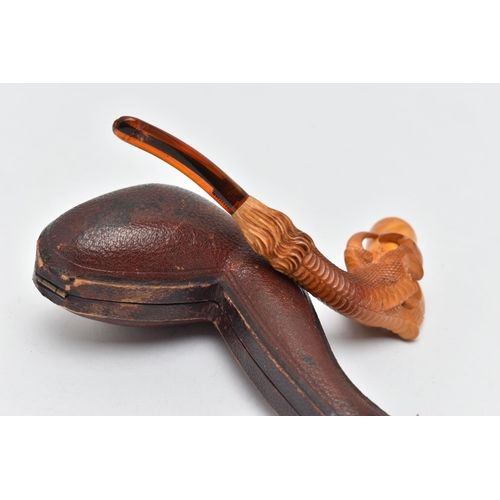 68 - AN AMBER AND MEERSCHAUM PIPE, in the form of an eagle talon gripping an amber chamber with amber mou... 