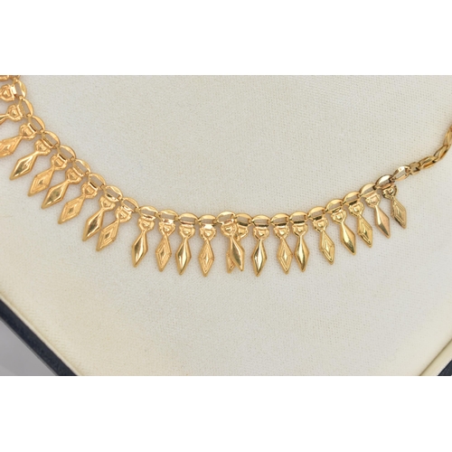 82 - A 9CT GOLD FRINGE NECKLACE, triangular fringe, fitted to the oval link chain, with spring clasp, hal... 