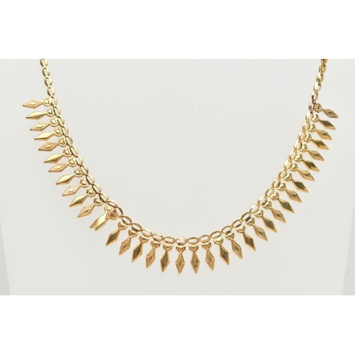 82 - A 9CT GOLD FRINGE NECKLACE, triangular fringe, fitted to the oval link chain, with spring clasp, hal... 