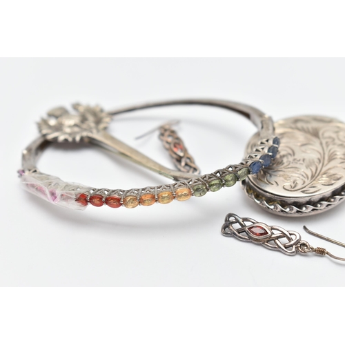 98 - FOUR ITEMS OF JEWELLERY, to include a white metal hinged bangle, set with a row of oval cut stones, ... 